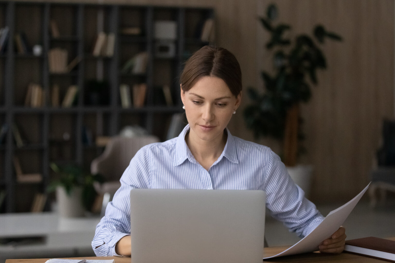 Computer,And,Papers.,Focused,Millennial,Woman,Office,Worker,Teacher,Freelancer